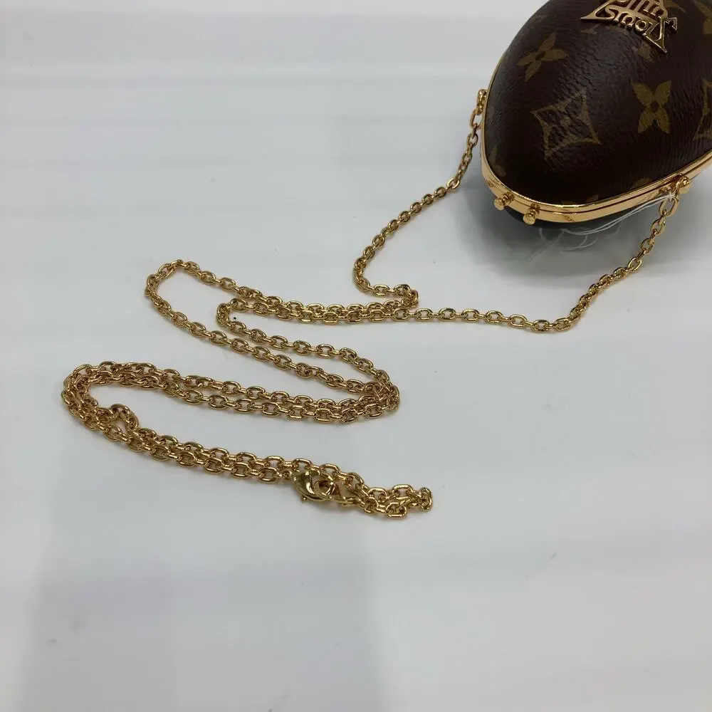 6056 - Louis Vuitton Cross Body Mini Monogram Egg Case